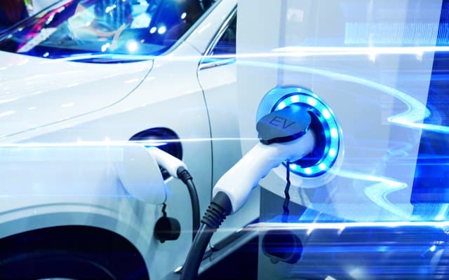 EV push sees more than 100 companies unite, TPG calls on Bank of America and GrainCorp surges on wheat prices